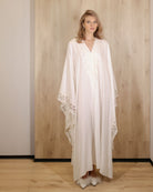 Full-length shot of the Cotton Kaftan without a belt, emphasizing the loose fit and freedom of movement.