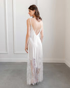 Back view of satin nightgown with lace train, photographed in daylight studio