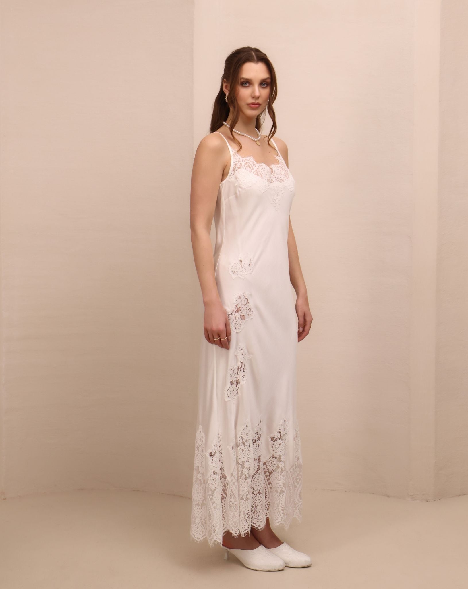A three-quarter view of the nightgown, focusing on the graceful fit and the airy, feminine design.