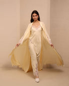 A motion shot of the Robe and Nightgown Set, capturing the lightweight fabric and floor-length silhouette.