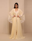A frontal shot of the tied robe, showcasing wide sleeves adorned with pretty lace and a flattering waistline.