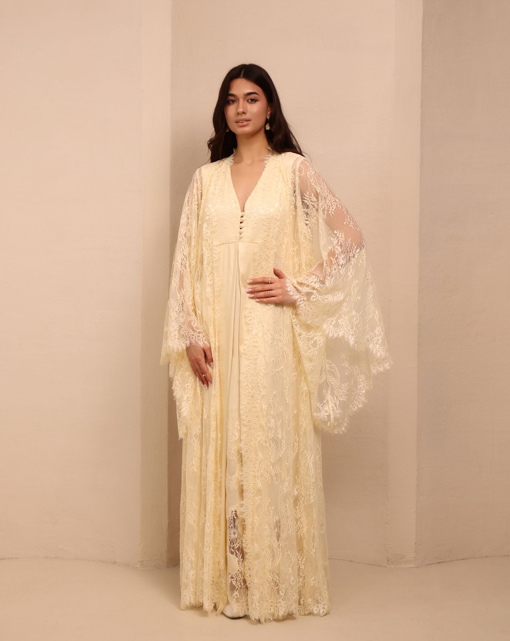 A full-length shot of the Maternity Robe and Nightgown Set, showcasing the wide lace sleeves and elegant drape.