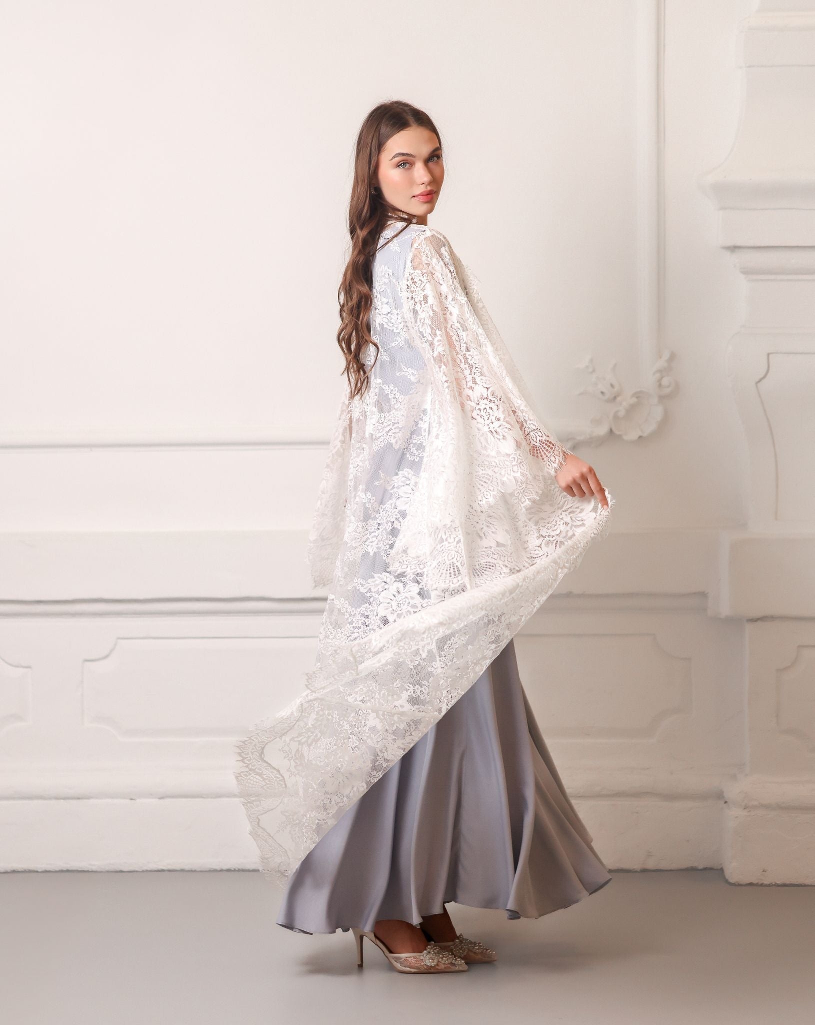 A spinning motion shot from a three-quarter angle, demonstrating the lightweight feel of the fabric.