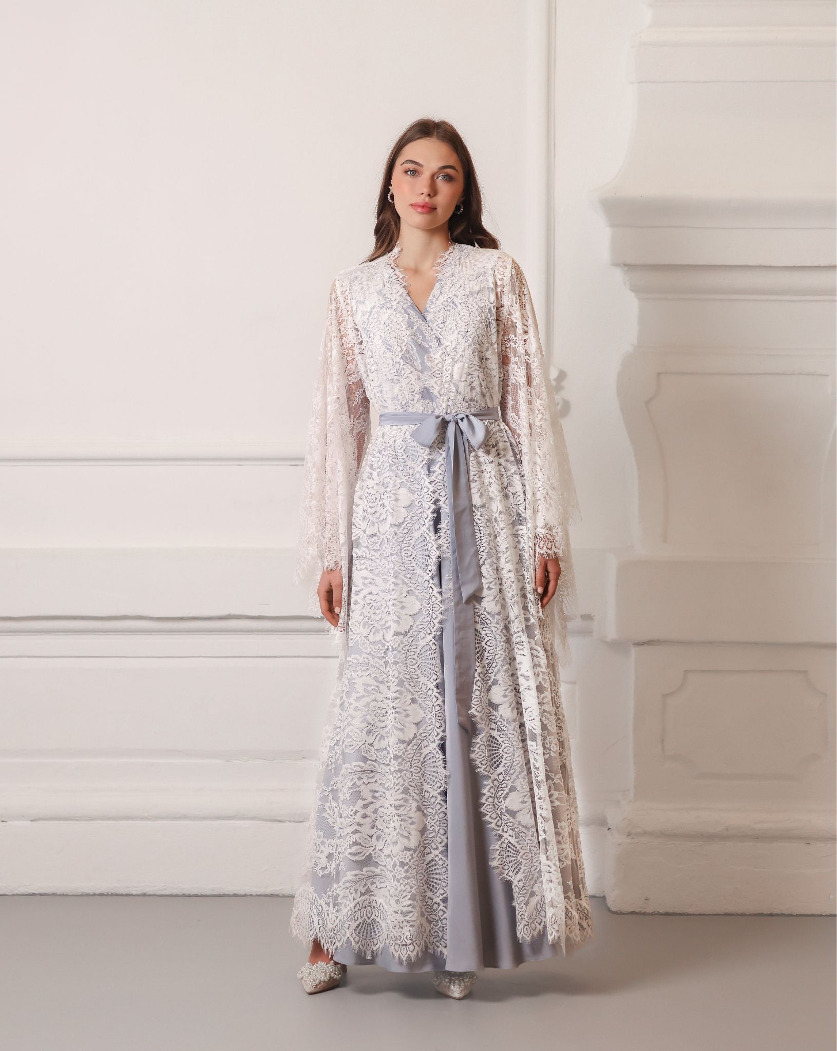 A poised static view of the full wrapped ensemble, illustrating the elegant coverage and soft lines.