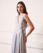 A mid-length view of the nightgown, highlighting the refined floral lacework details along the fabric.