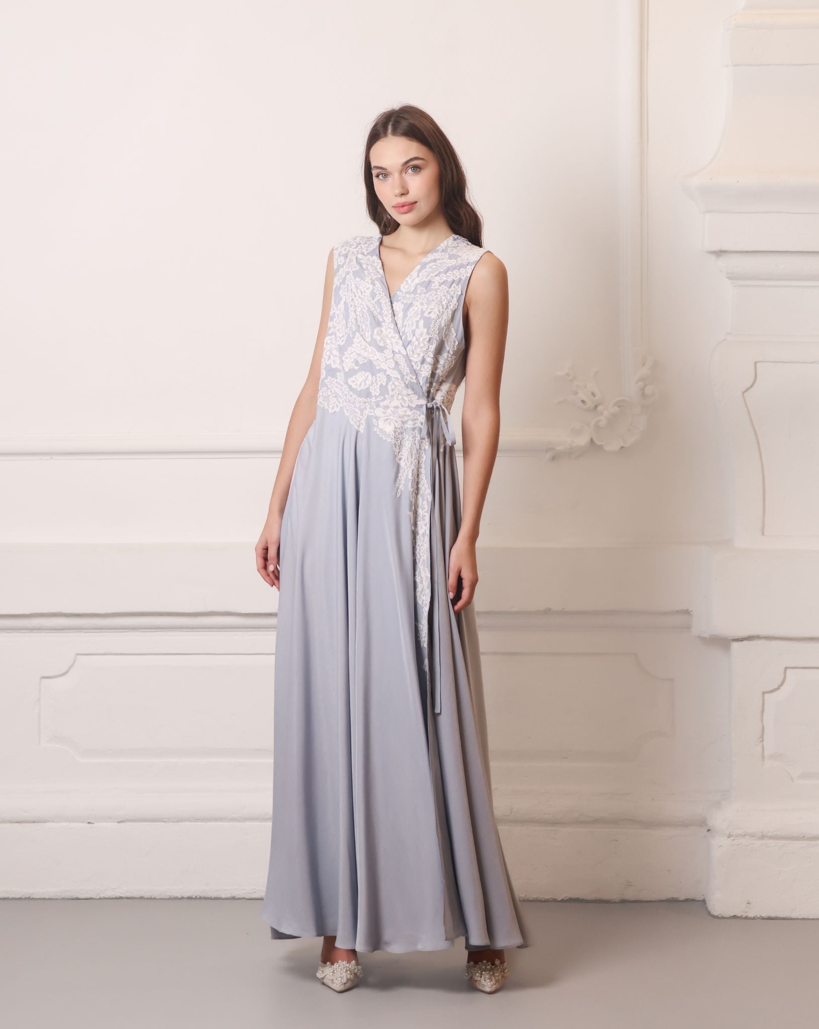 A direct front shot of the nightgown, highlighting the clean neckline designed to accommodate a growing belly.