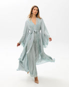 A full-length motion shot of the Robe and Nightgown Set, capturing the breathable and fluid drape of 100% viscose.