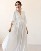 Close-up of the ensemble in motion, emphasizing the breathable material and the graceful drape of the floor-length robe.