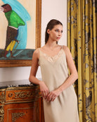 Mid-length shot of the slip dress, showcasing the natural ease of the material and its softly sensual design.
