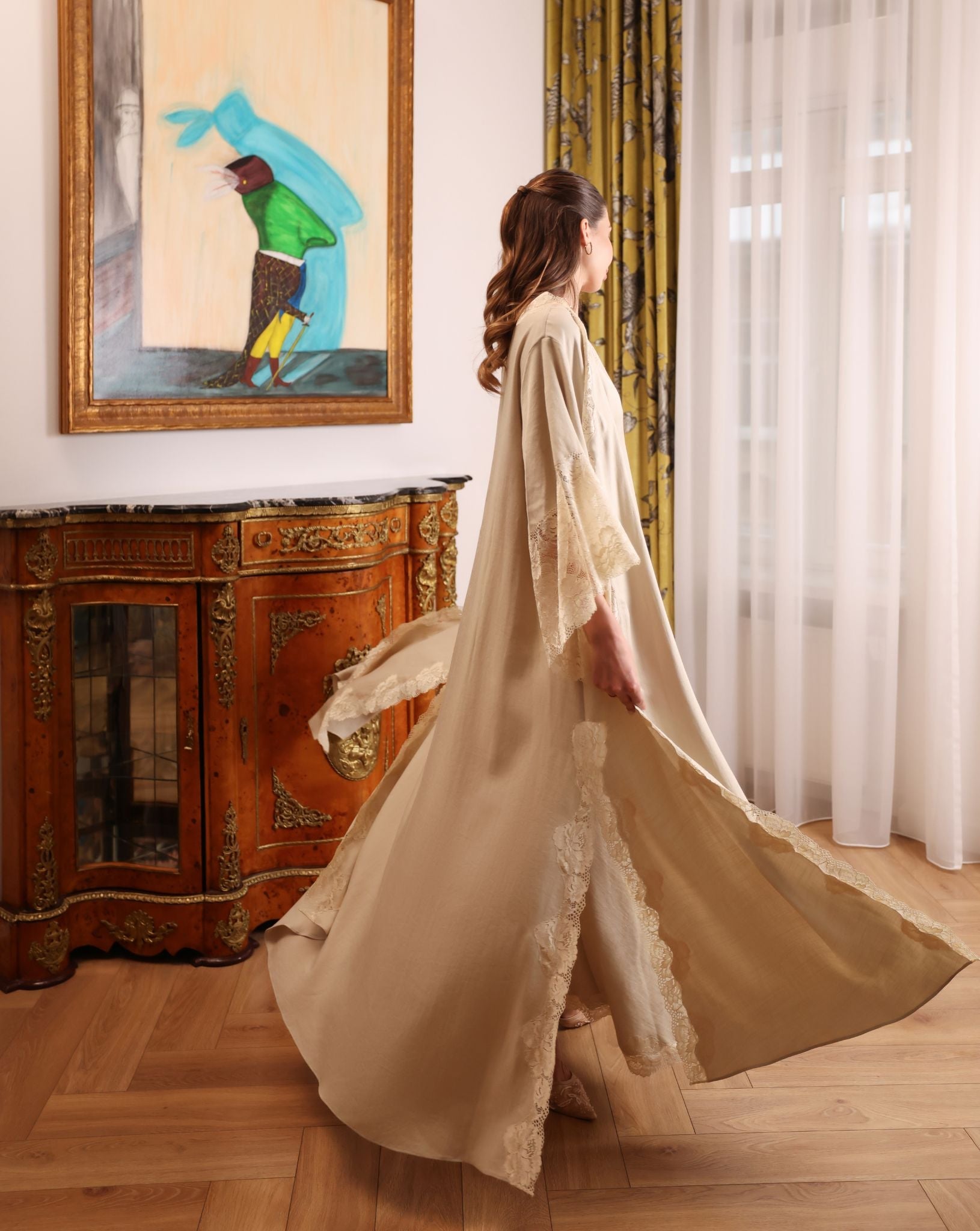 A dynamic turn showcasing how the fabric moves effortlessly with every step, creating a sense of calm movement.