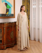 A static full-height view of the layered nightwear, designed for living slowly and feeling composed at home.