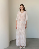 A poised frontal view of the set, highlighting the lightweight cotton fabric and delicate lace layer.