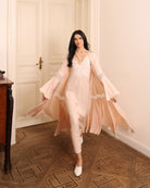 A dynamic view of the flowing set in motion, showcasing its airy silhouette and effortless grace during movement.