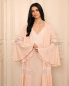 Mid-length shot showing the sleeve details and the light, reassuring feel of the material against the skin.
