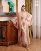 A serene shot of the cotton pajama set, capturing a mood of quiet beauty and relaxation at home.