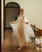 Close-up of the exceptionally long and flowing sleeves of the bridal silk wrap, made from 100% mulberry silk.