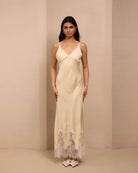 Frontal view of the nightdress, featuring delicate lace that trims the cups and the bottom edge for a fine touch.