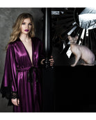 Mid-length shot of the Purple Robe, showcasing the wide elegant sleeves and the majestic lines of the design.